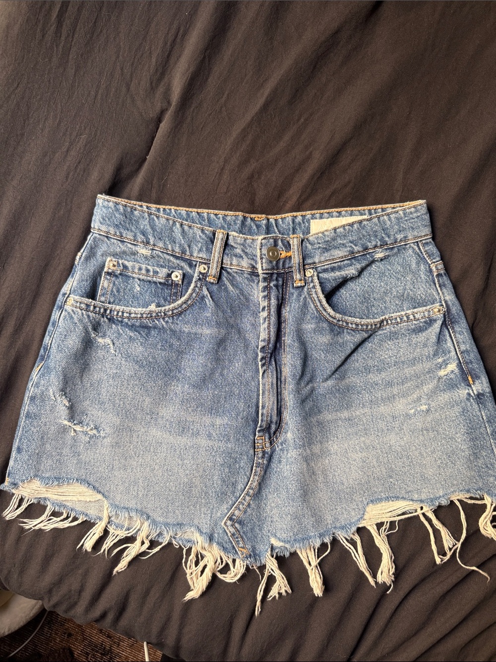 Zara High-Rise Distressed Denim Skirt in Medium Blue